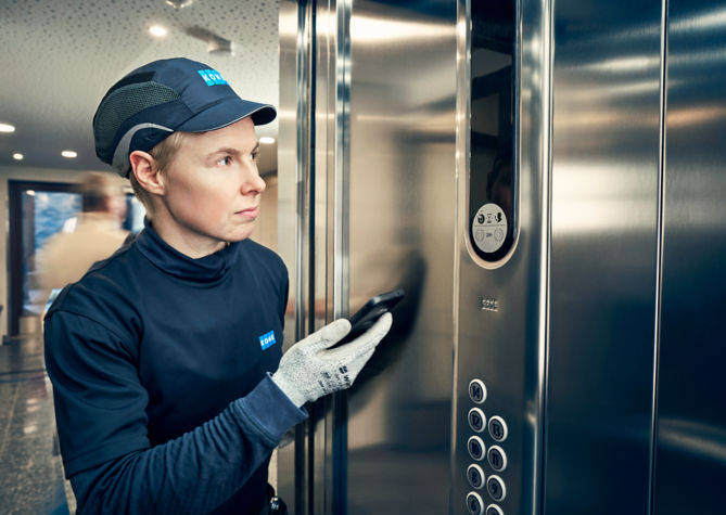 KONE technician in a lift