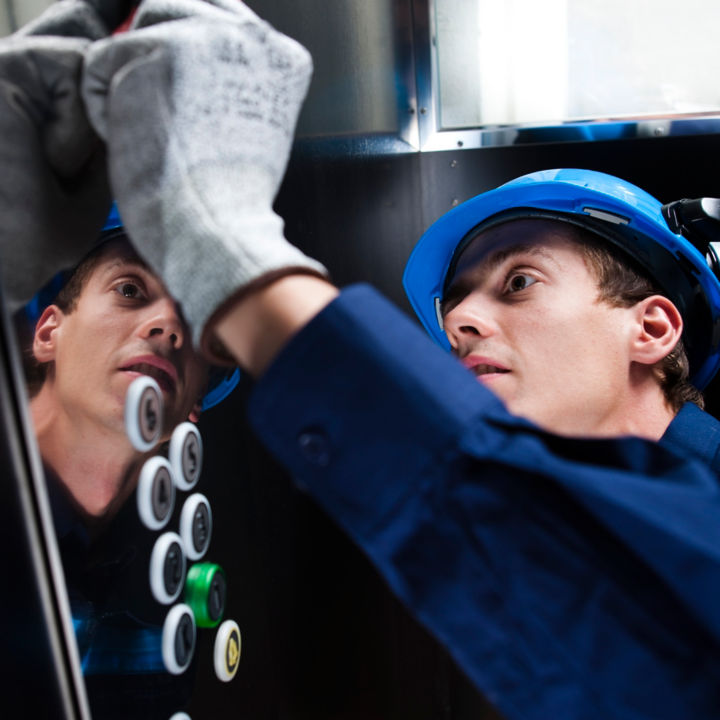 KONE Technician upgrading an elevator.