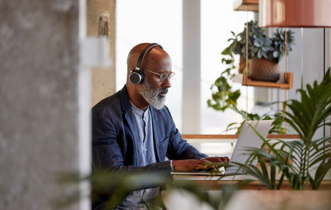 older_man_in_the_office_shutterstock_1895457241-1:667x424