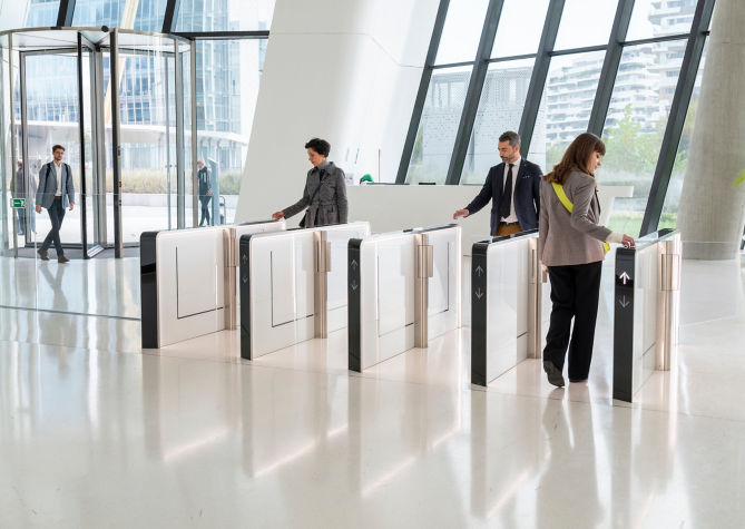 people_entering_in_office-3:669x475