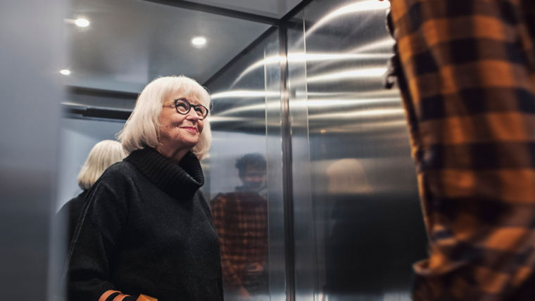 senior_lady_in_the_residential_elevator-1:760x428%2816-9%29