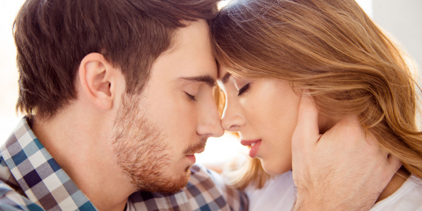 Close-up of a couple embracing.