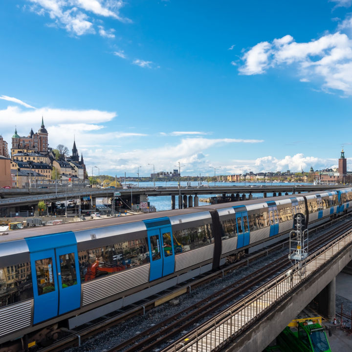 View of the center of Stockholm with metro train in the foreground.