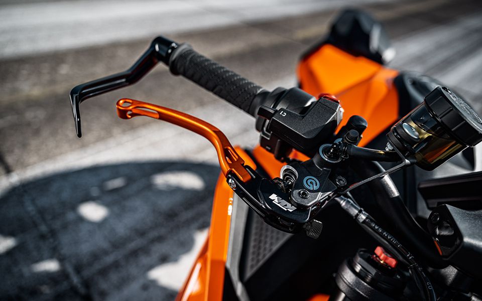 A detailed close-up view of a KTM motorcycle engine showcasing its intricate components and design.
