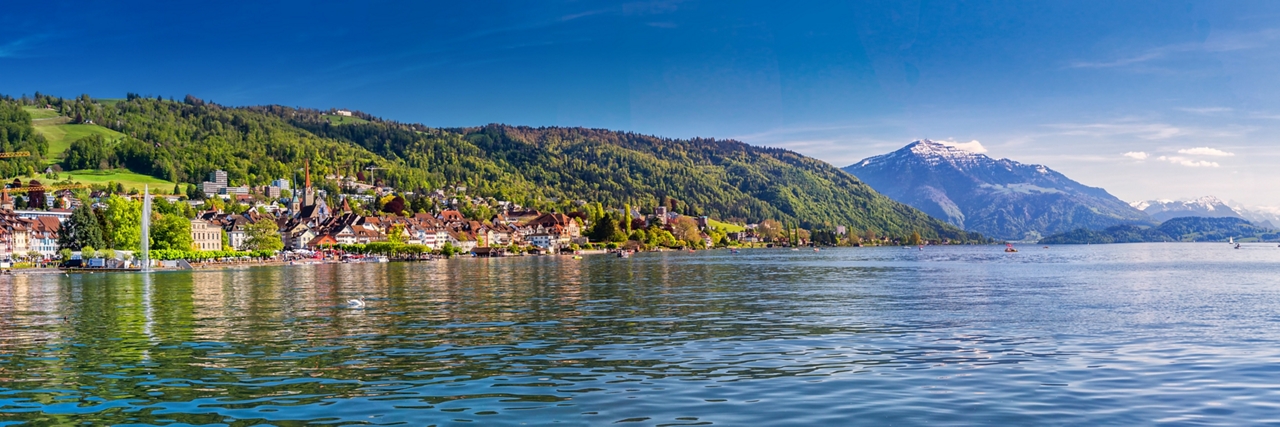ZUG, SWITZERLAND - May 6, 2016 - Zug old town with colorful houses, Zugersee and Rigi mountain, Zug, Switzerland, Europe. 
