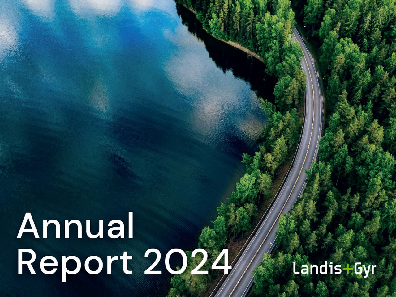 Image de couverture du rapport annuel 2024 de Landis+Gyr avec vue aérienne de la forêt, de la route et du lac