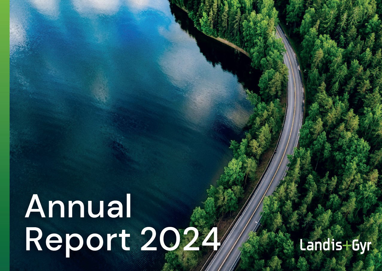 Imagem de capa do Relatório Anual Landis+Gyr 2024 com vista aérea da floresta, estrada e lago