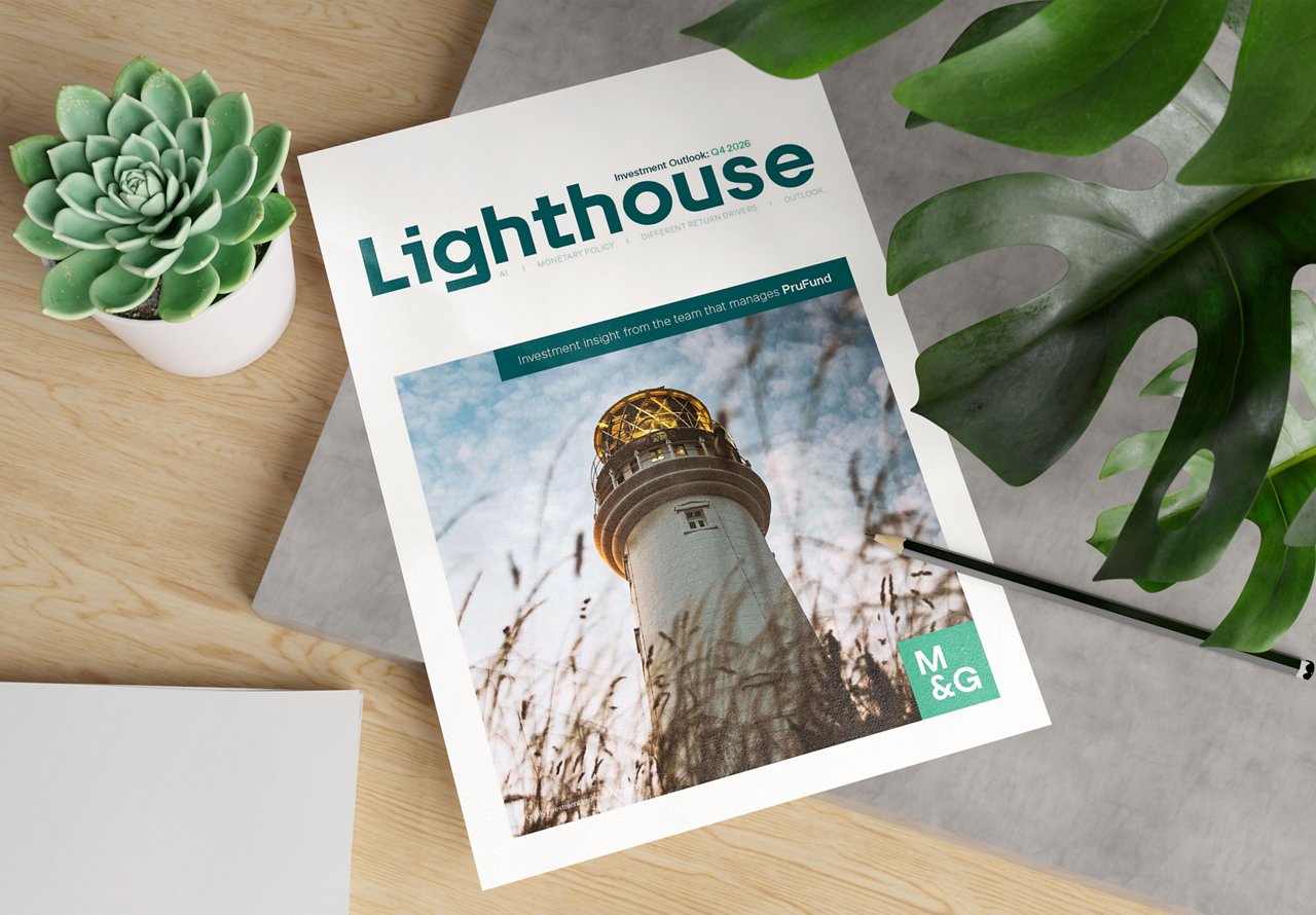 Lighthouse magazine with a lighthouse image on the cover, displayed on a desk.