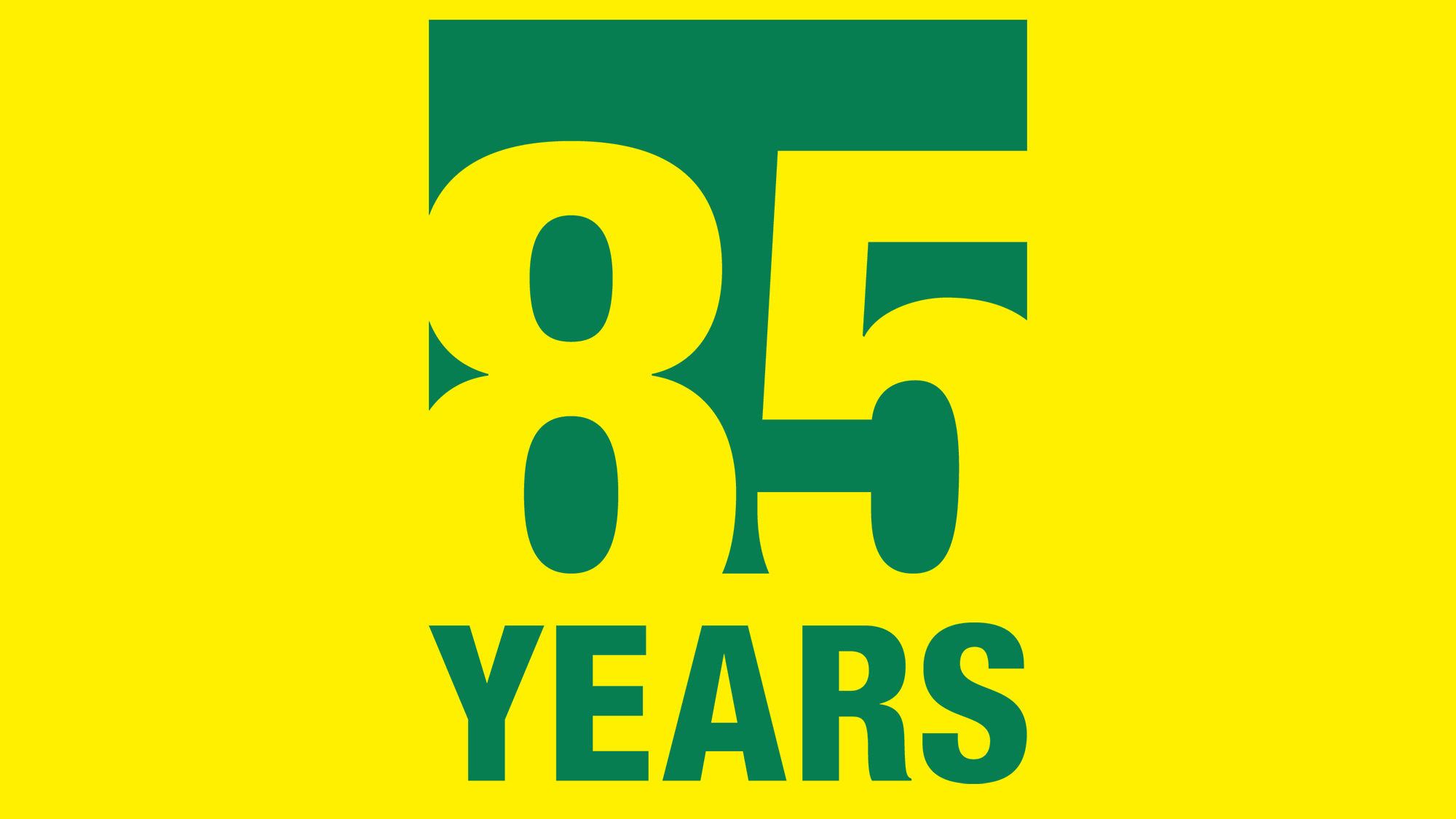 Cartel del 85º aniversario en amarillo y verde para conmemorar el aniversario de MANN-FILTER