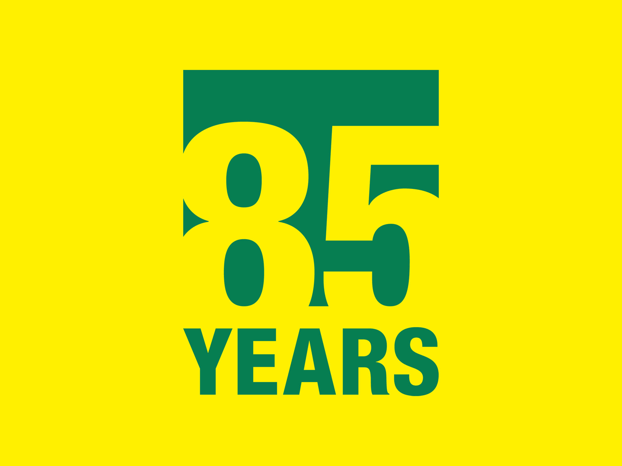 85 years anniversary signe in yellow and green to mark the jubilee of MANN-FILTER