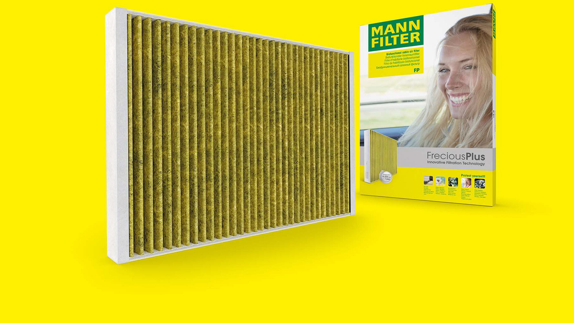 Filtro de aire de habitáculo antialérgico MANN-FILTER amarillo FreciousPlus junto a su caja
