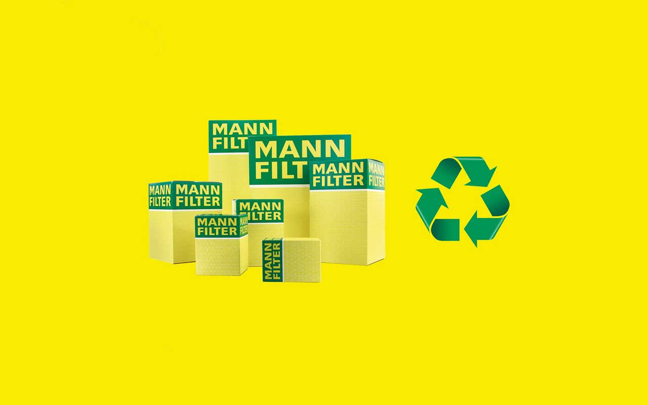 El embalaje de producto MANN-FILTER amarillo-verde con fibras recicladas.
