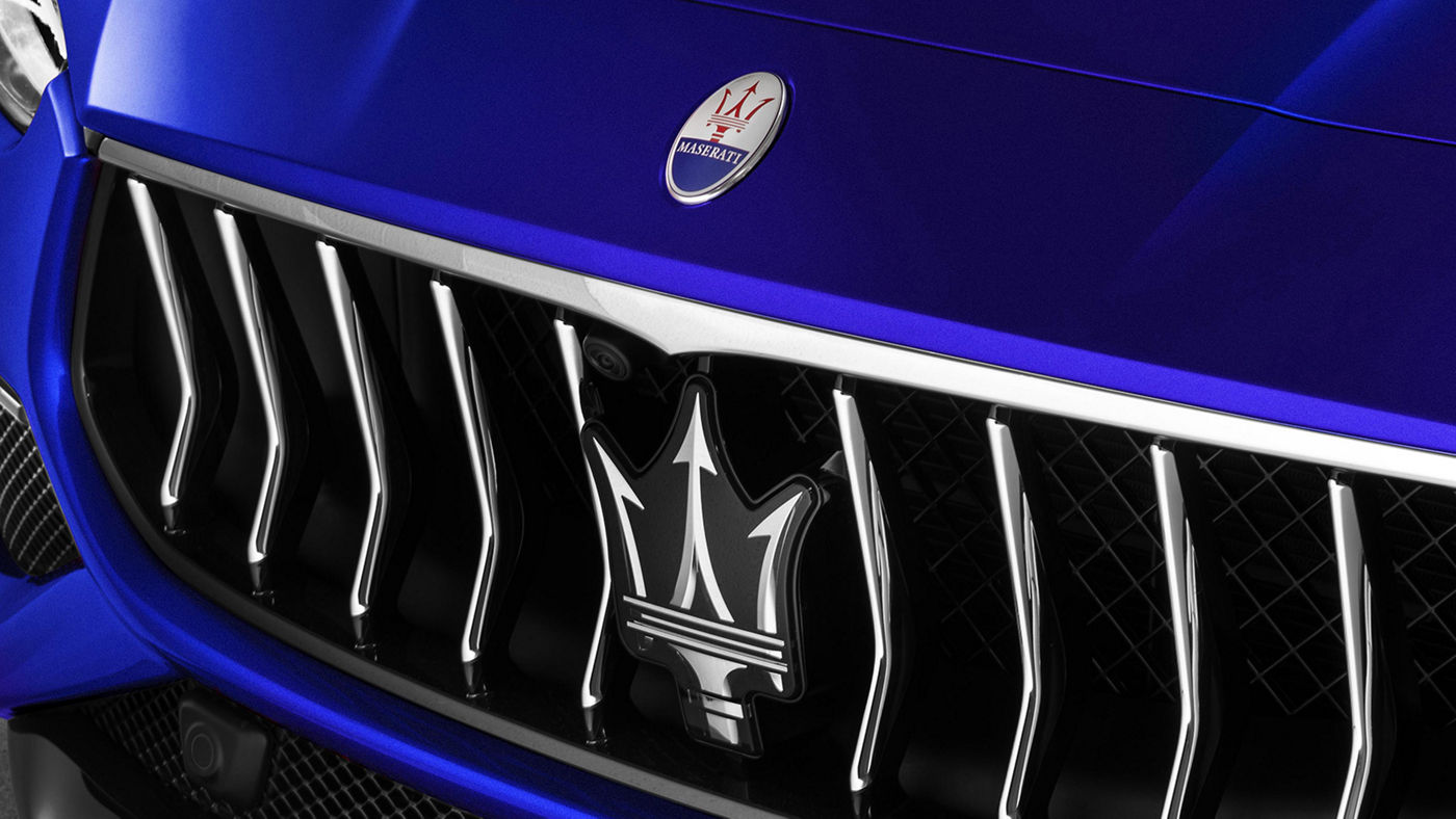 Detail of Maserati logo on Bumper of Maserati 