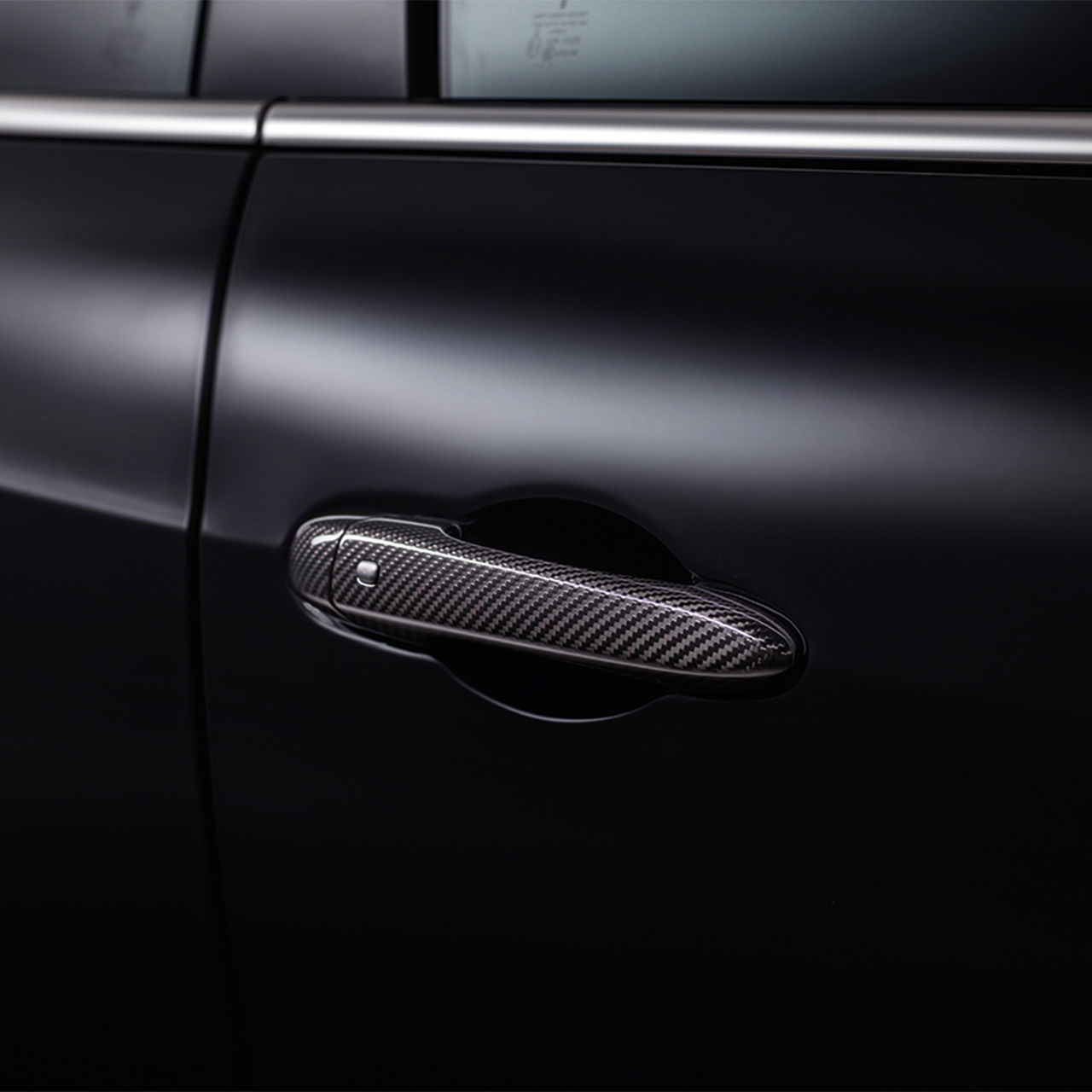 Maneta de la puerta de carbono en Maserati Quattroporte