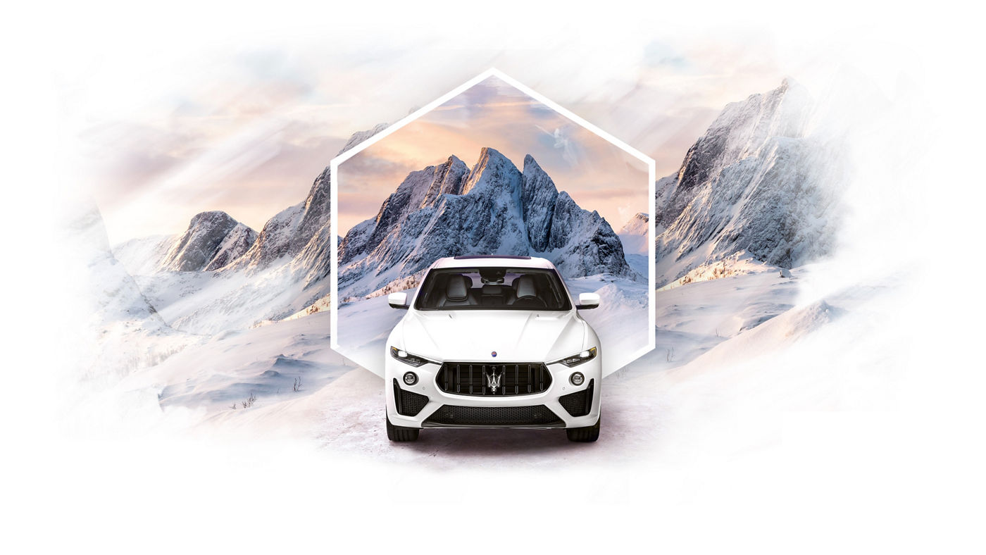 Maserati Levante delante de montañas