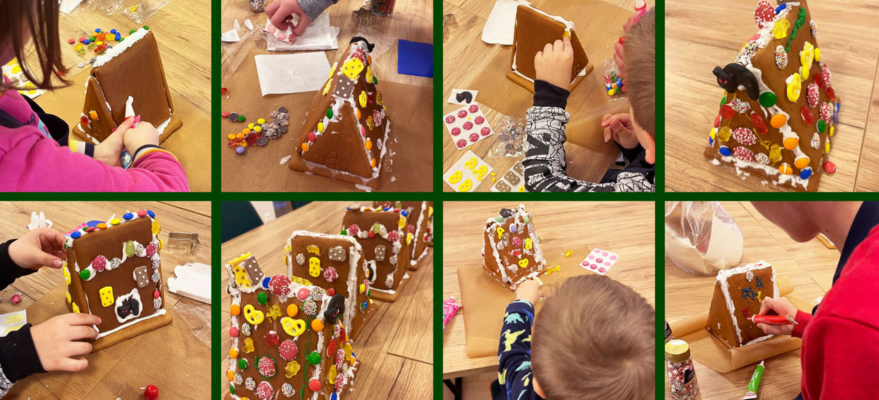 Kinder verzieren Lebkuchenhäuser mit bunten Süßigkeiten an einem Tisch. 