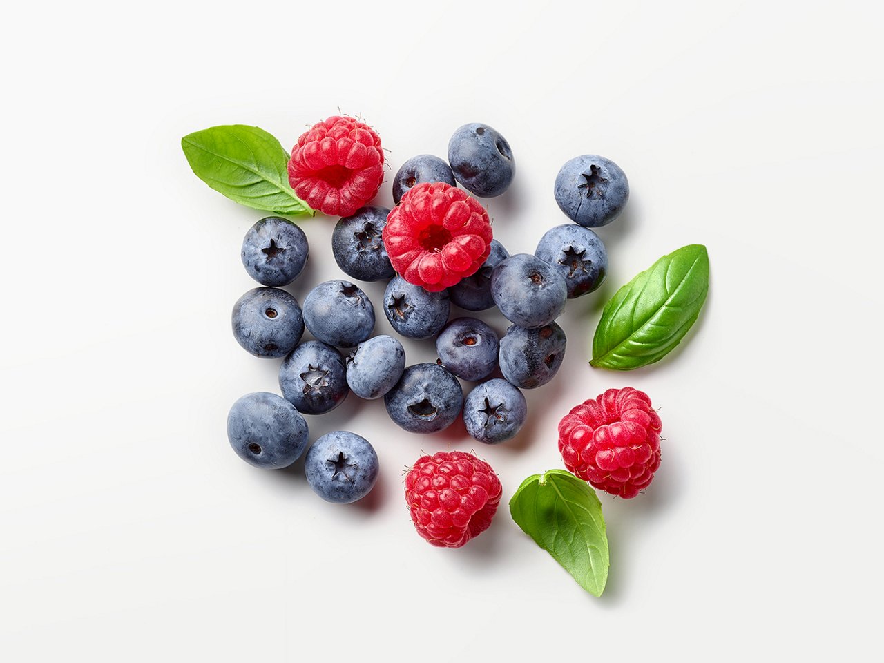 Himbeeren und Blaubeeren