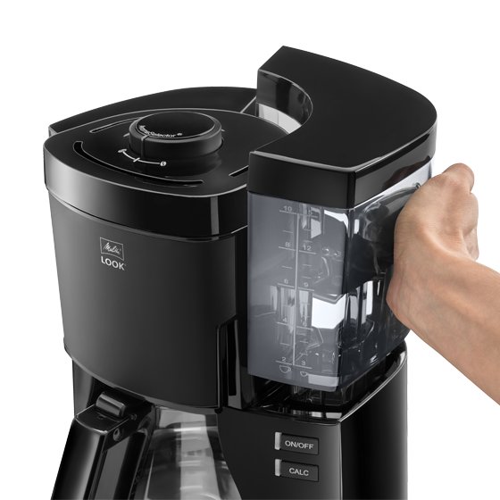 Melitta® Look Filter Coffee Maker 6782599 hand gabbing Watertank Closeup with water level indicator