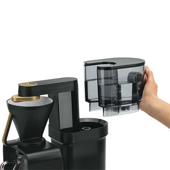 Melitta® epour Filter Coffee Maker 6772303 – water tank held in hand, being lifted
