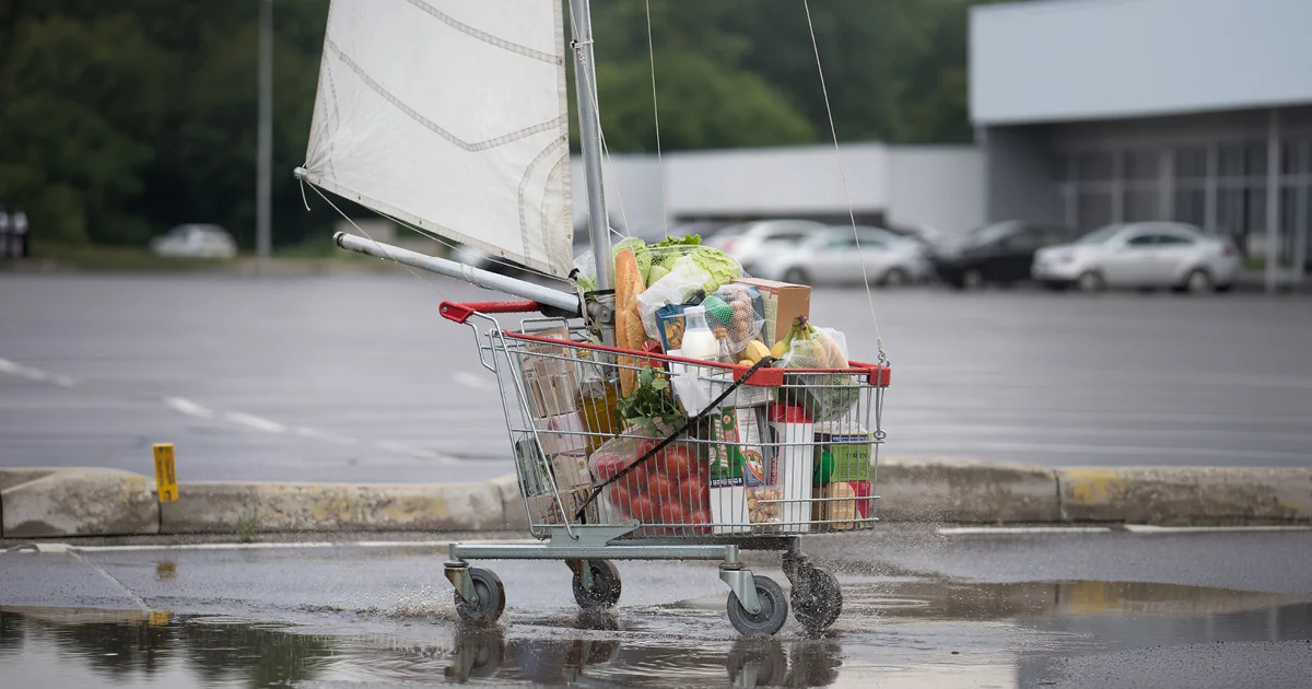 Sailboat Shopping Cart in Empty Parking Lot