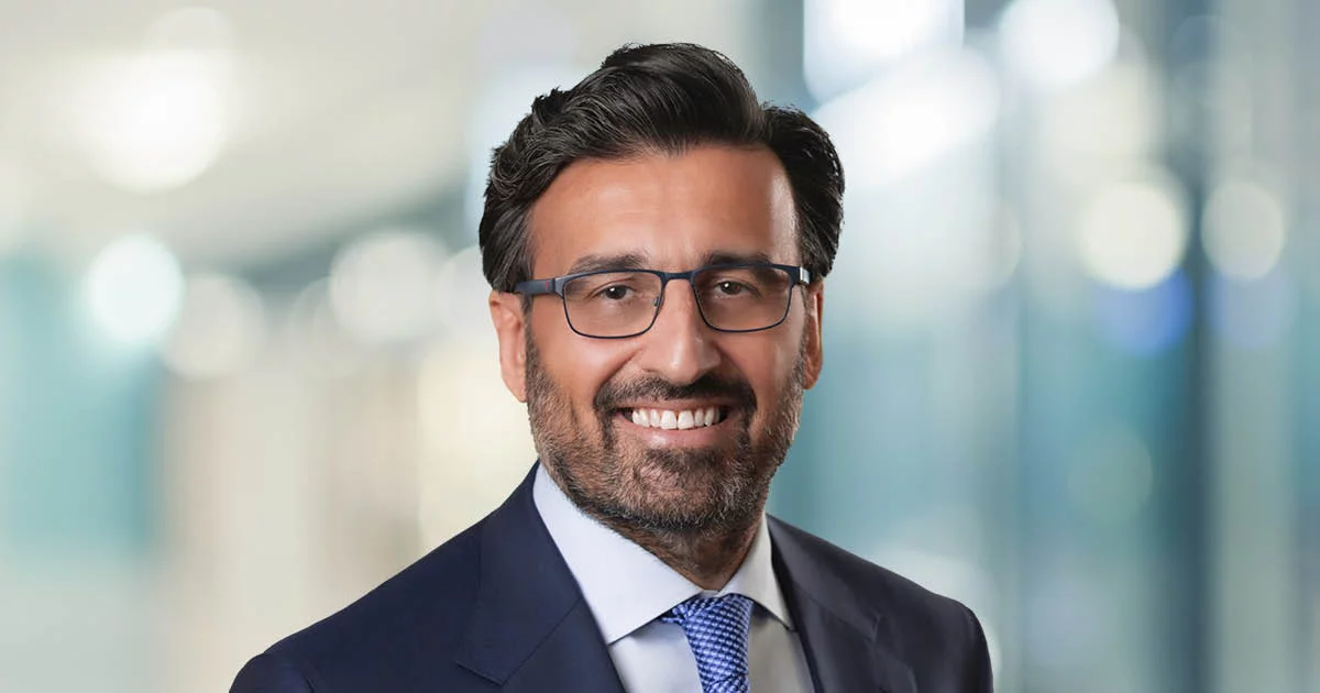 Smiling businessman in suit and tie portrait
