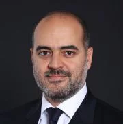 Professional portrait of middle-aged man in suit