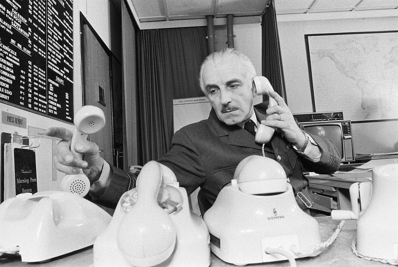 A staff member operates the phones in the Situation Centre at NATO Headquarters in Brussels, Belgium.