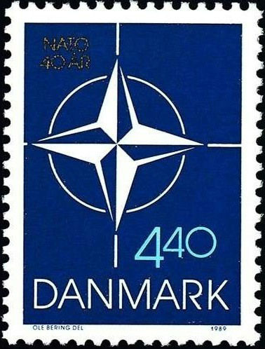 1989 Danish NATO stamp, a simple dark blue design with the NATO logo