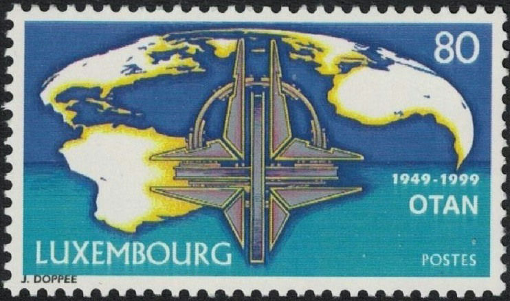 1999 Luxembourgish NATO stamp, with the NATO star sculpture in front of a world map 