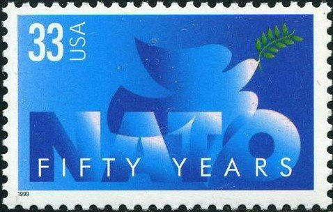 1999 American NATO stamp, with a dove of peace and NATO in blue