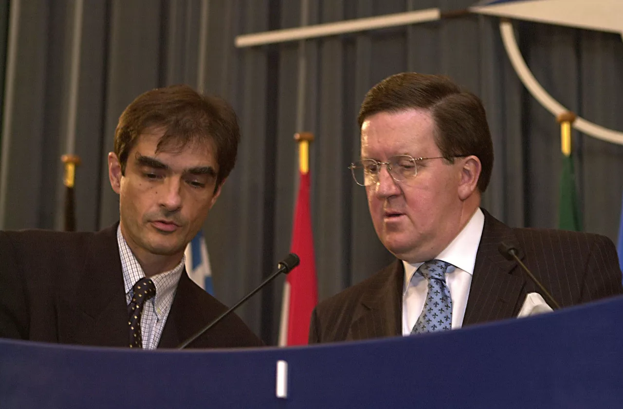 NATO Spokesperson Yves Brodeur and NATO Secretary General Lord Robertson at the press conference following the meeting of the North Atlantic Council