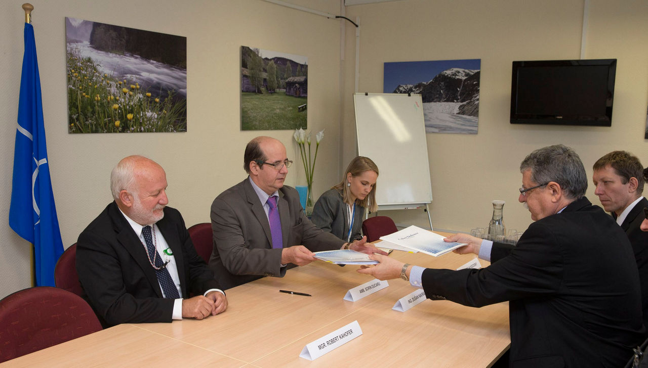 Ambassador Sorin Ducaru, NATO ASG ESC,  and Dusan Navratil, Director of the Czech National Security Authority, at the signing of the Cyber Defence MOU between the Czech Republic and NATO 12 October 2015. 