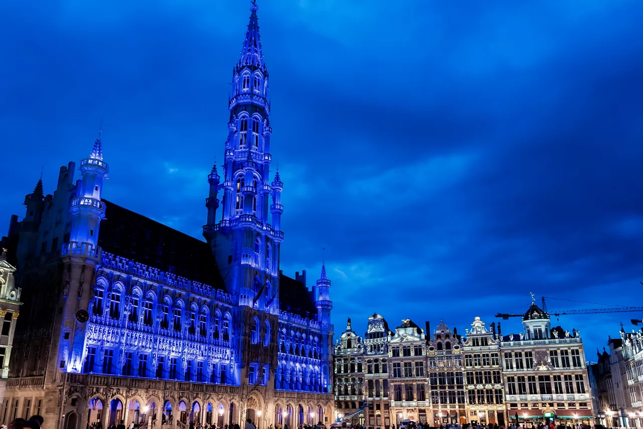 The Brussels Town Hall in the UNESCO-listed Grand Place illuminated in NATO blue