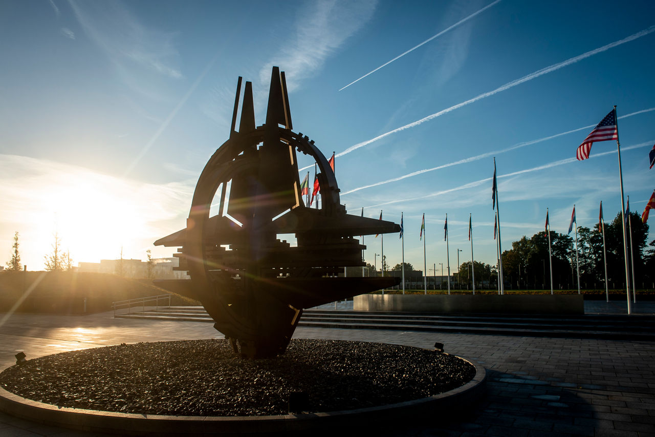 Shots of NATO Headquarters - flags and sculpture