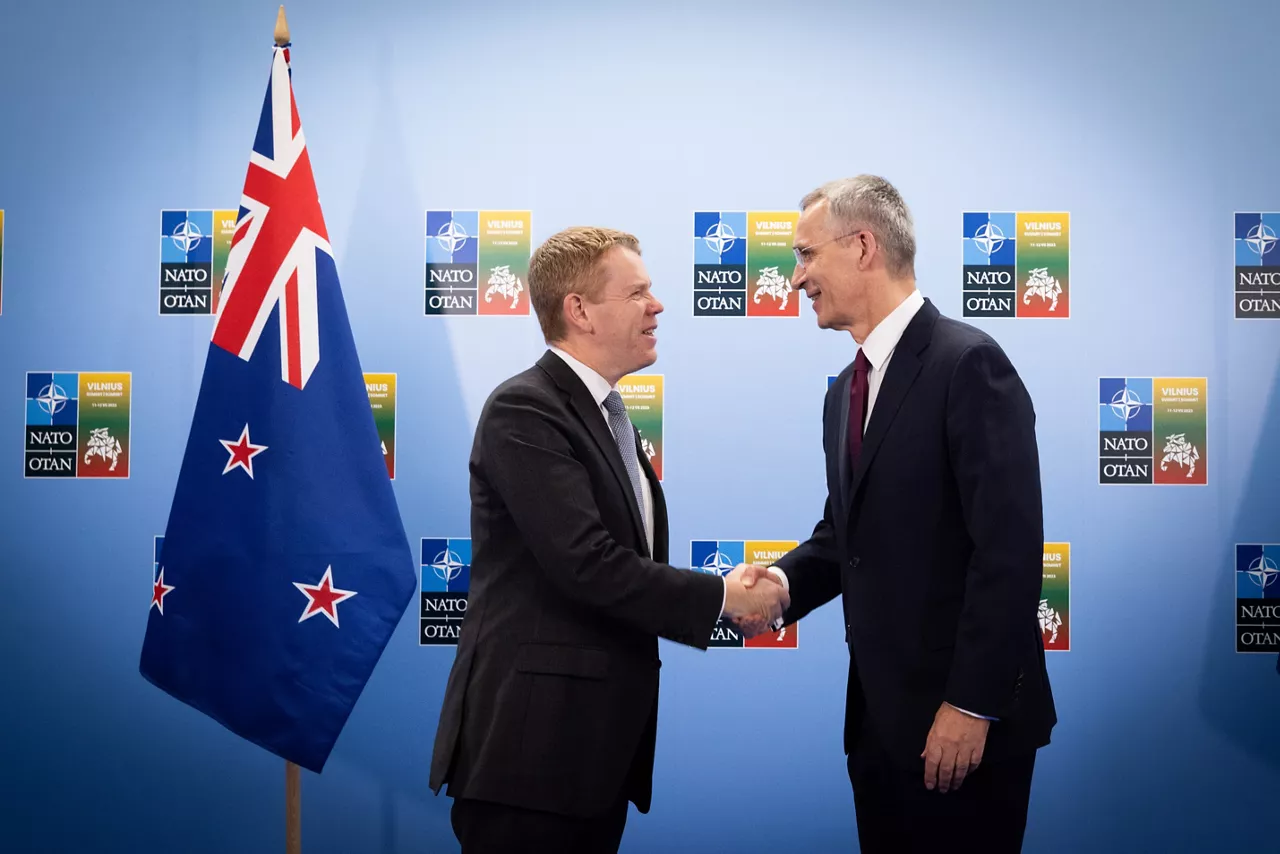 Left to right:  Christopher Hipkins (Prime Minister of New Zealand) shaking hands with NATO Secretary General Jens Stoltenberg