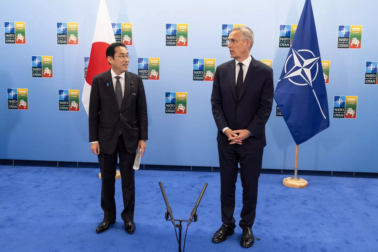 Left to right: Fumio Kishida (Prime Minister of Japan) with NATO Secretary General Jens Stoltenberg