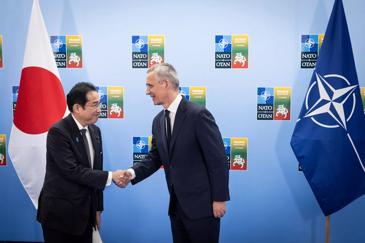 Left to right: Fumio Kishida (Prime Minister of Japan) with NATO Secretary General Jens Stoltenberg