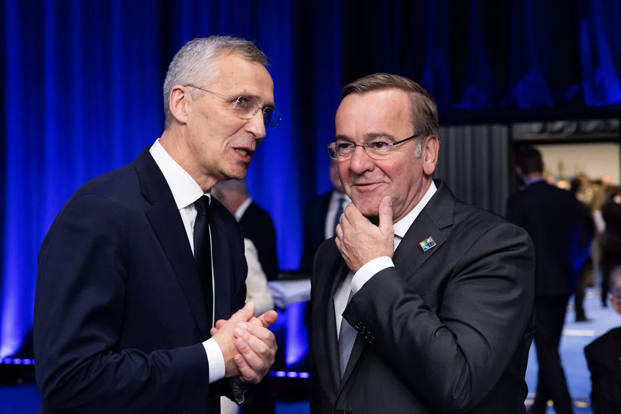 Left to right: NATO Secretary General Jens Stoltenberg talking with Boris Pistorius (Minister of Defence, Germany)