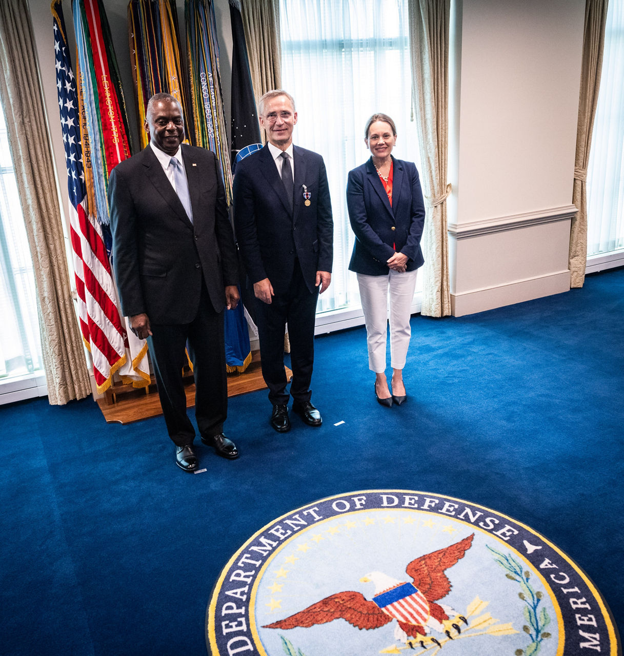 Left to right: Lloyd J. Austin III (US Secretary of Defense) with NATO Secretary General Jens Stoltenberg and Julianne Smith (US Permanent Representative to NATO)
