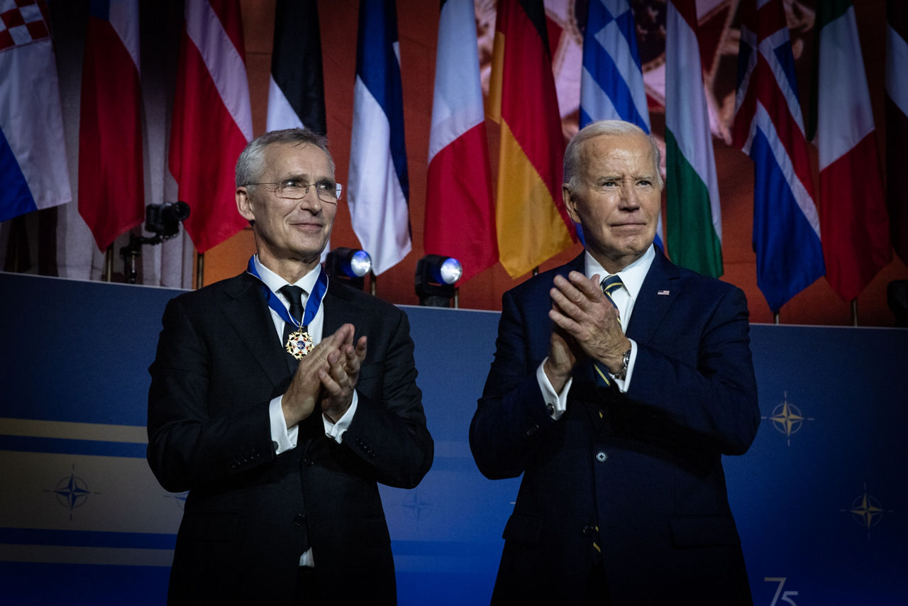 Left to right: NATO Secretary General Jens Stoltenberg is awarded a medal by US President Joe Biden
