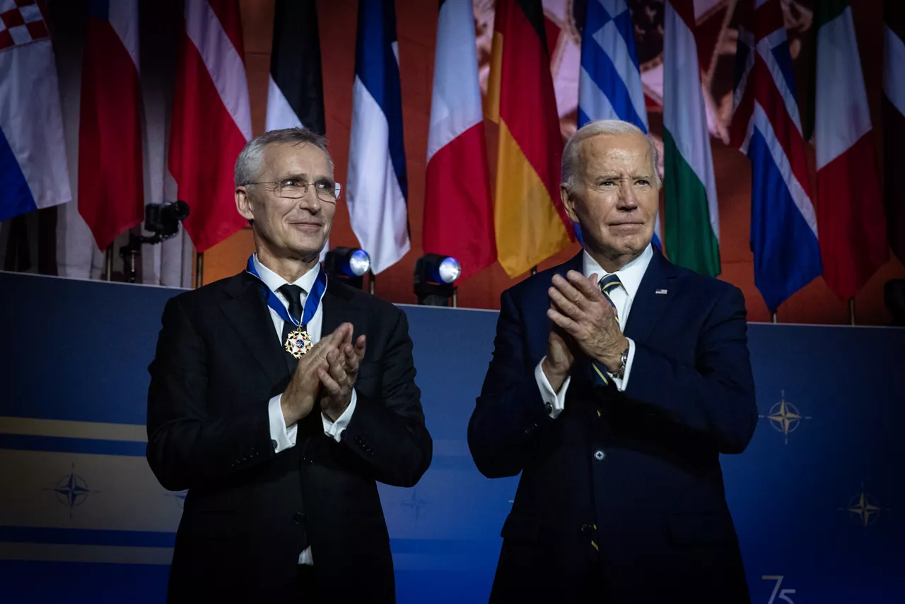 Left to right: NATO Secretary General Jens Stoltenberg is awarded a medal by US President Joe Biden