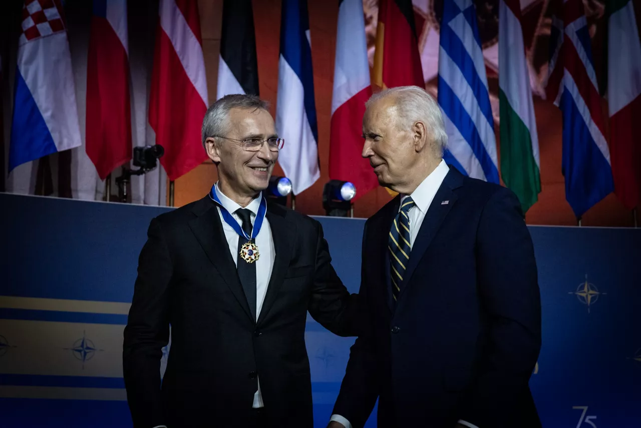 Left to right: NATO Secretary General Jens Stoltenberg is awarded a medal by US President Joe Biden