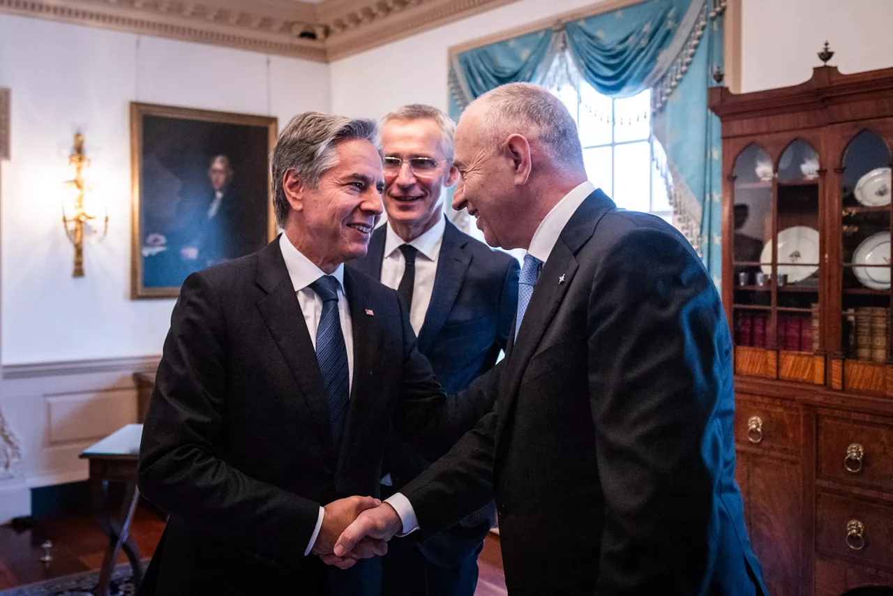 Left to right: Antony J. Blinken (US Secretary of State) shaking hands with NATO Deputy Secretary General Mircea Geoana