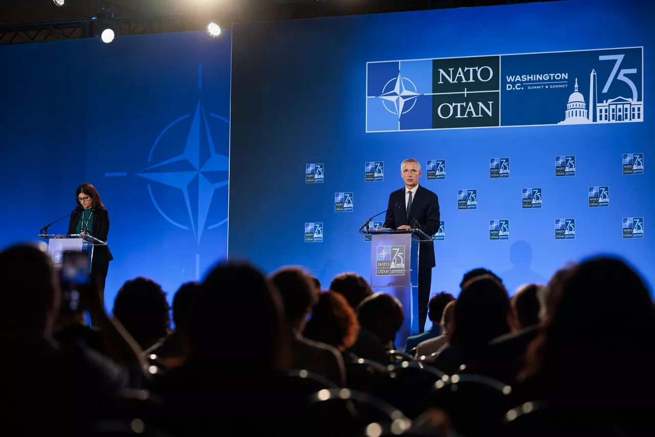 NATO Secretary General Jens Stoltenberg and NATO Spokesperson Farah Dakhlallah
