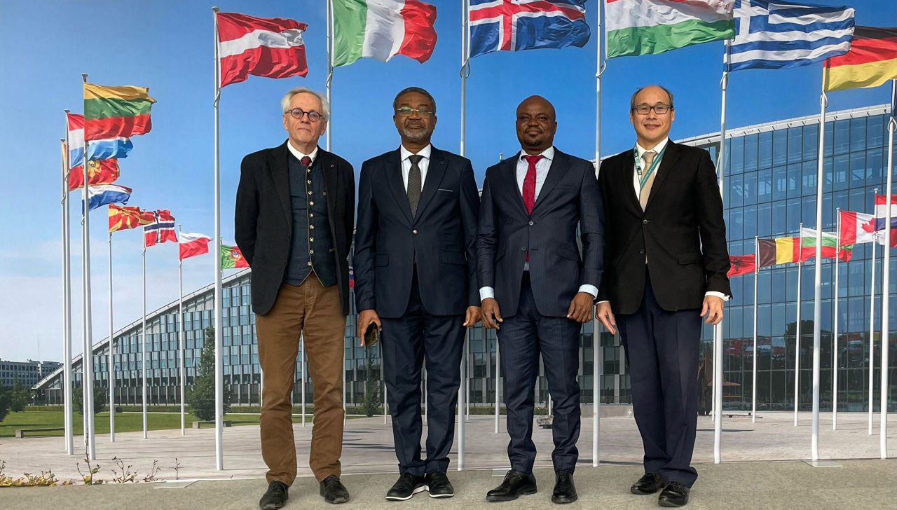 Former IBAN member Franz Wascotte, Beninese delegation members Roland Zinzindohoué and Serge Batonon, and IBAN member Sébastien Lepers

