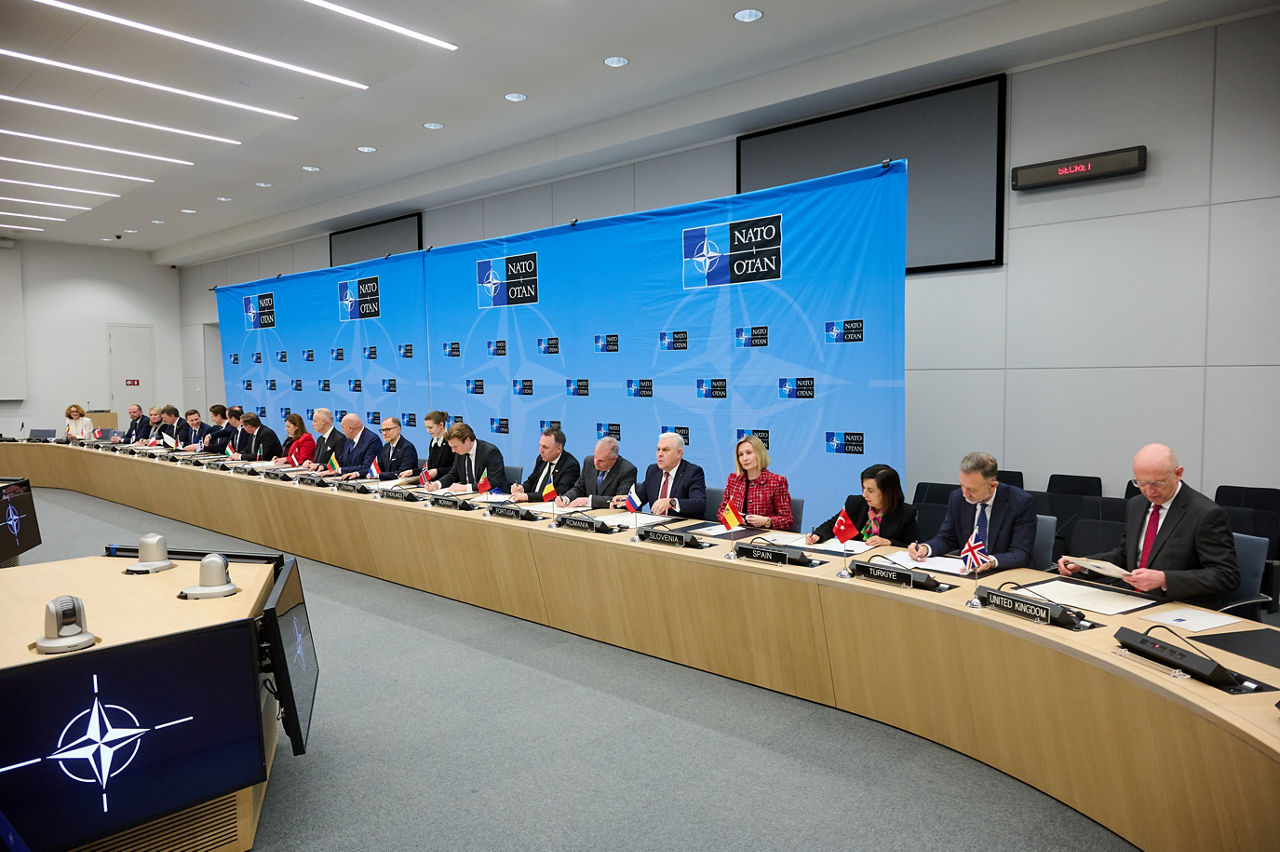 Signing ceremony led by the Defence Investment Division of Letters of Intent and Memorandums of Understanding on Multinational Cooperation - Meeting of NATO Ministers of Defence, Brussels