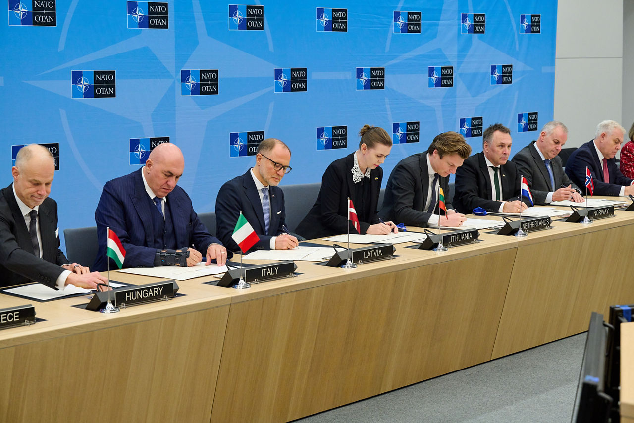 Signing ceremony led by the Defence Investment Division of Letters of Intent and Memorandums of Understanding on Multinational Cooperation - Meeting of NATO Ministers of Defence, Brussels