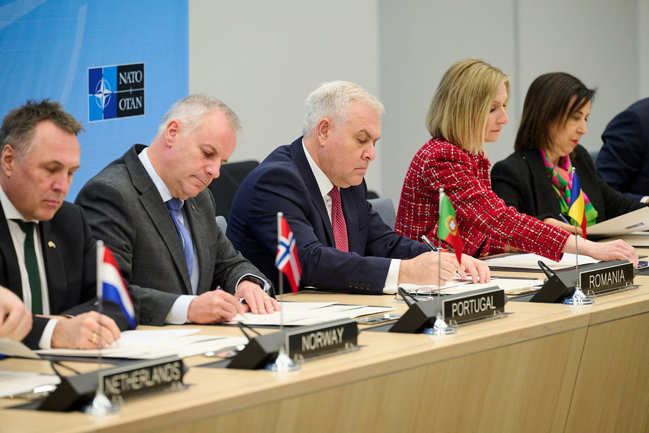 Signing ceremony led by the Defence Investment Division of Letters of Intent and Memorandums of Understanding on Multinational Cooperation - Meeting of NATO Ministers of Defence, Brussels