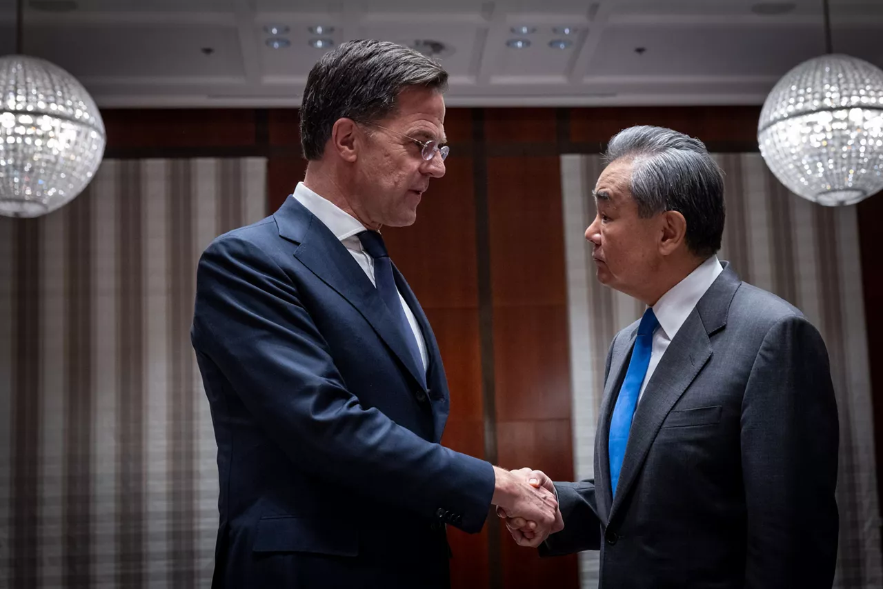 NATO Secretary General Mark Rutte with the Minister of Foreign Affairs of China, Wang Yi