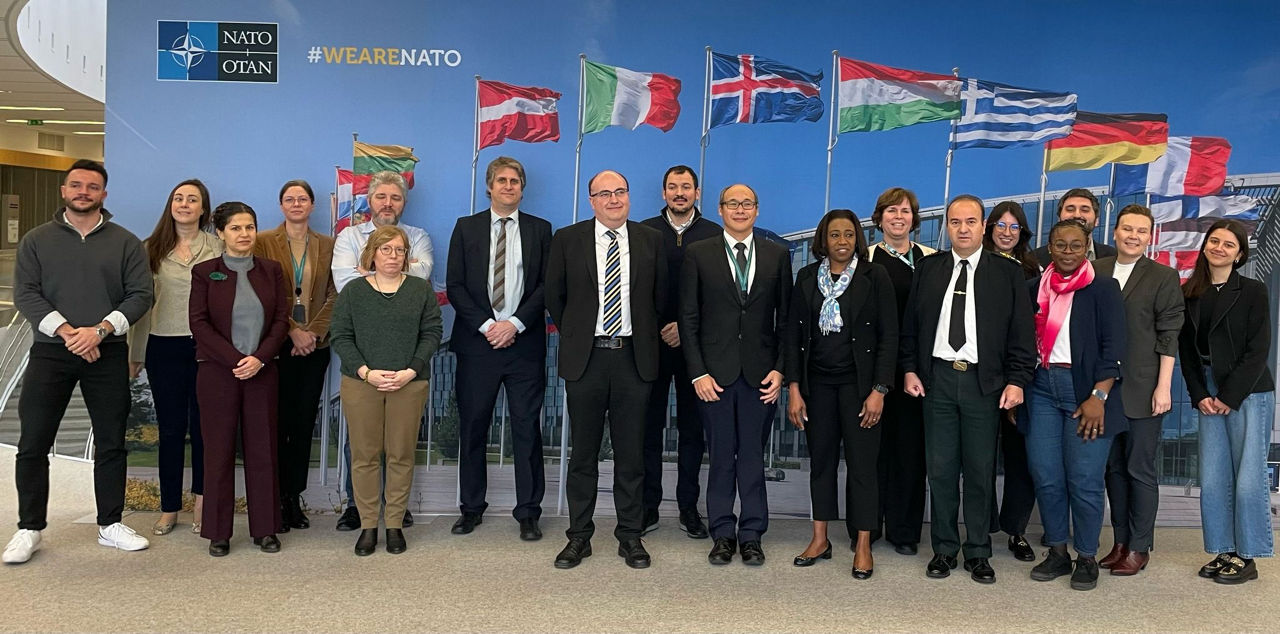 IBAN’s management and staff, alongside Ms Lilian Ndianefo and Mr Jamie Patterson, from the UK’s National Audit Office